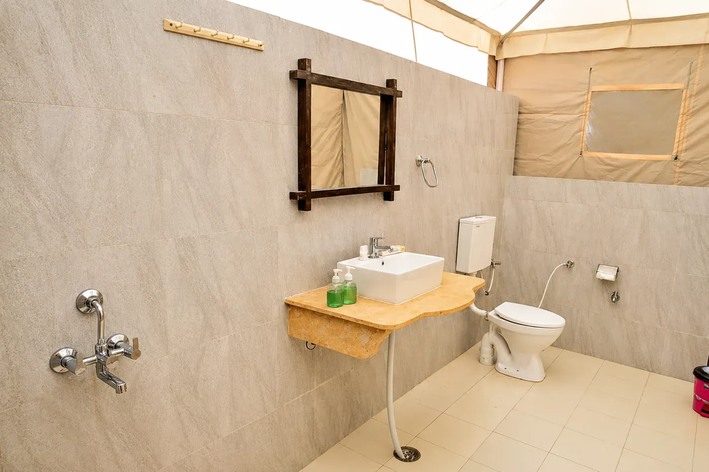 Attached private bathroom in Deluxe Swiss Tent